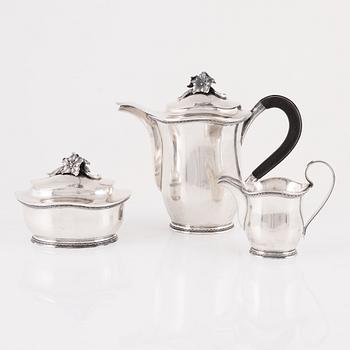 Eric Råström, a silver  Coffee pot, sugar bowl and creamer, CG Råström Stockholm 1973.