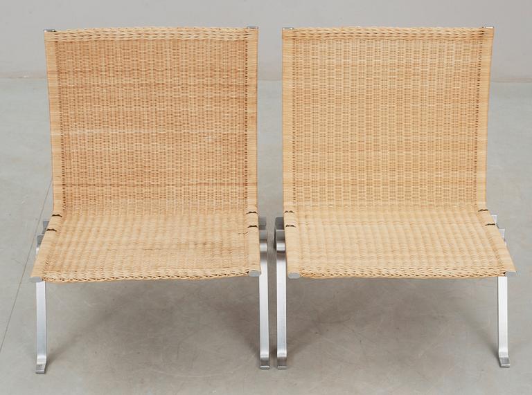 A pair of Poul Kjaerholm 'PK-22' steel and rattan easy chairs, Fritz Hansen, Denmark.