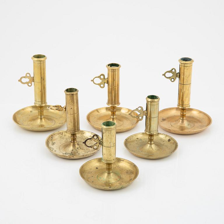 A set of six brass candlesticks, 19th/20th Century.