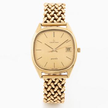 Certina, 14K gold, chain in 18K gold, 33.5 mm.