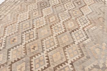 A Kelim carpet, c. 340 x 262 cm.