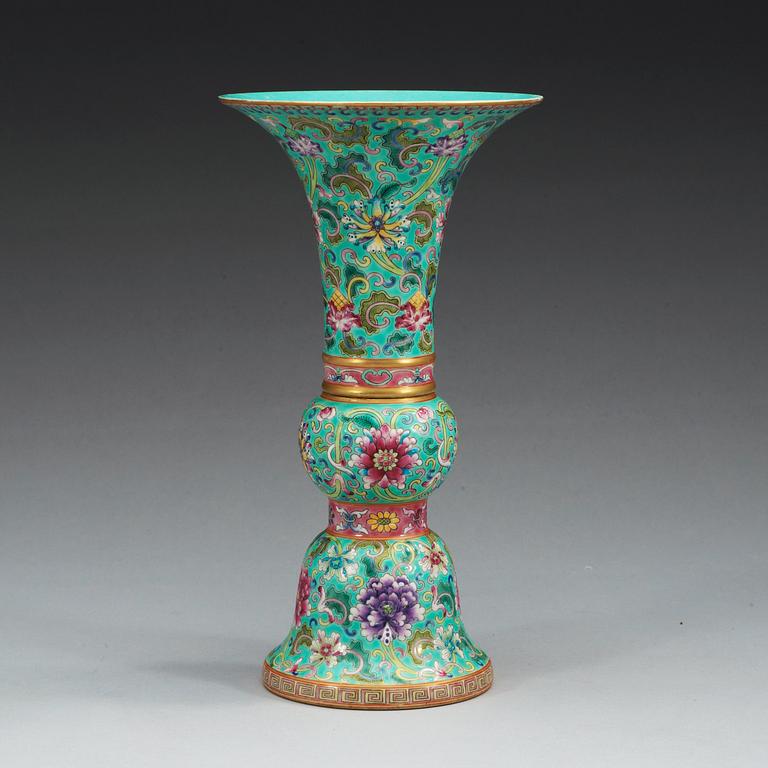 A famille rose against turquoise ground vase, 20th Century, with Qianlong mark.