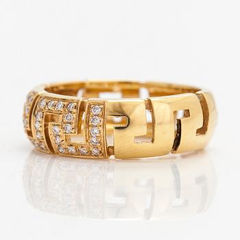 Versace, An 18K gold ring with diamonds ca. 0.12 ct in total. Marked Versace.