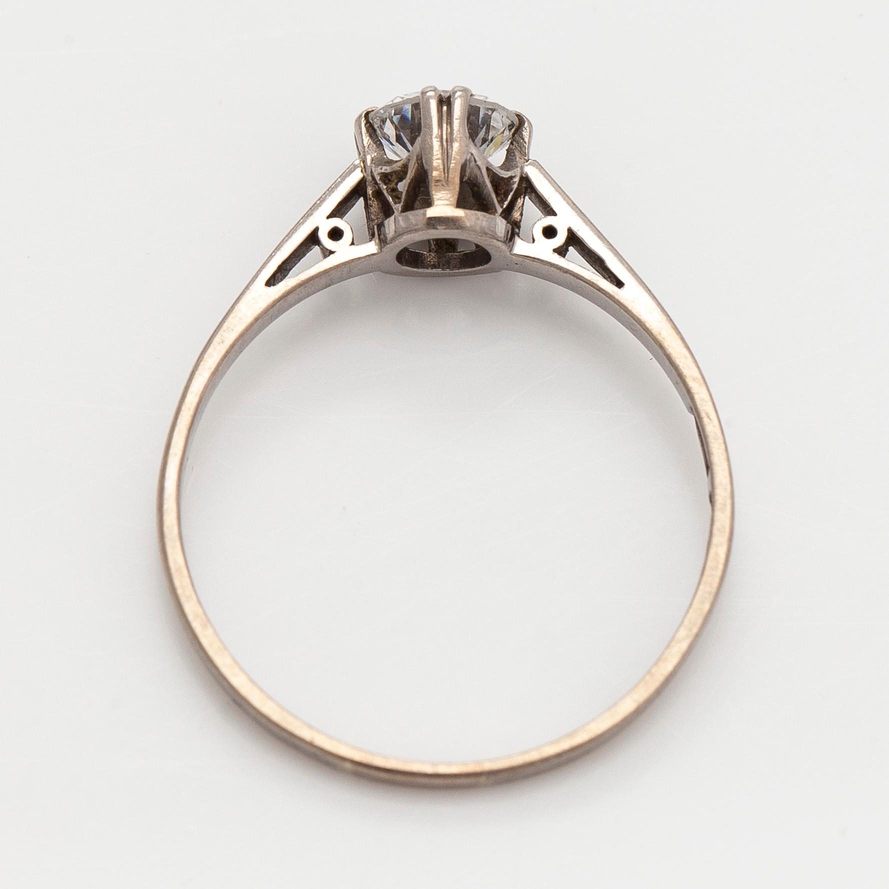 Ring, 18K vitguld med briljantslipad diamant.