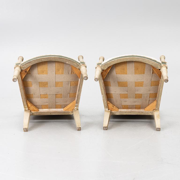 A pair of armchairs, Directoire, France, late 18th Century.