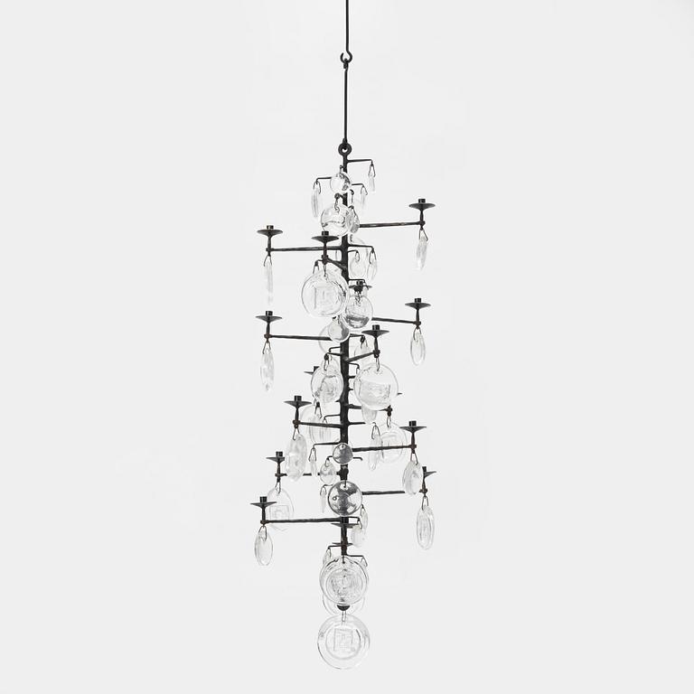 Erik Höglund, a 16 light chandelier for Boda Smide, Sweden.