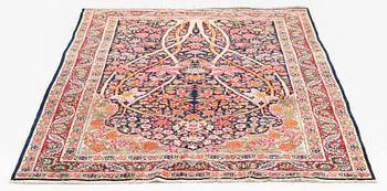 An antique Kerman, so called 'Millefleurs tree-of-life' rug, southeast Persia, c. 211 x 138 cm.