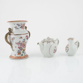 A Chinese export famille rose urn, teapot and jug, Qing dynasty, 18th century.