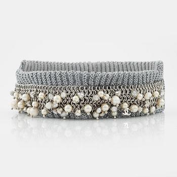 Chanel, a pearl, strass and rhinestone headband.