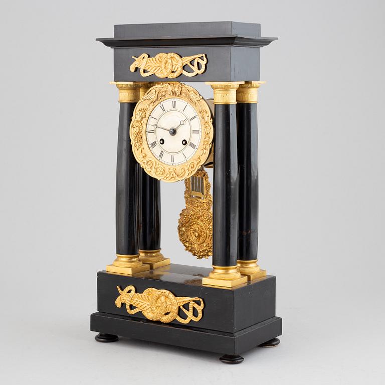 A mid 19th Century mantel clock.