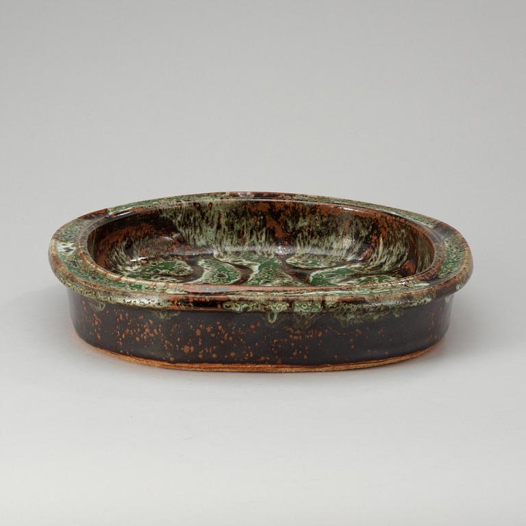 An Erik Pløen green and brown glazed stoneware dish, Norway.