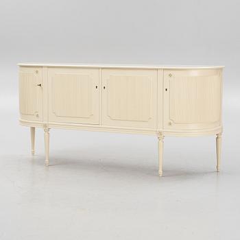 A gustavian style sideboard, mid 20th century.