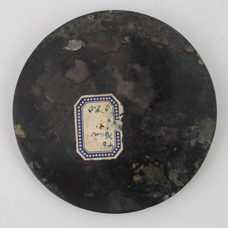 Four bronze lobed mirrors,  Han dynasty (206 B.C.-220 A.D.).