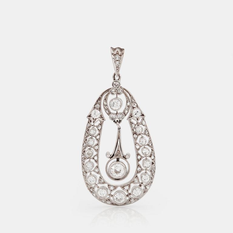 A PENDANT set with old-cut diamonds.