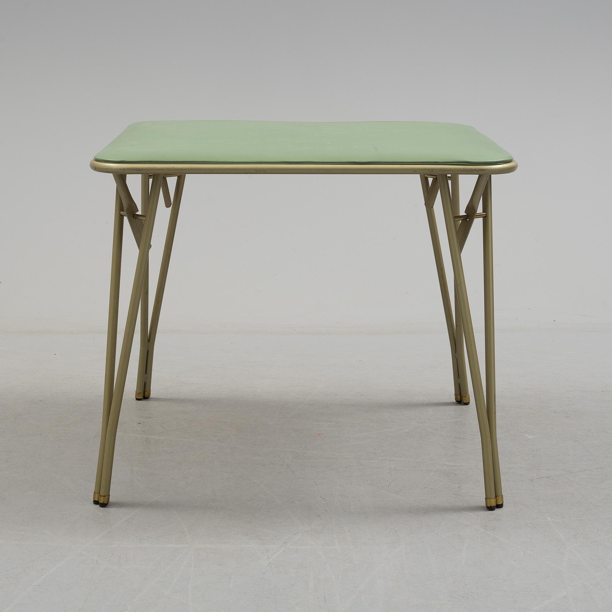 A table and four chairs by Dipetrol, second half of the 20th century.