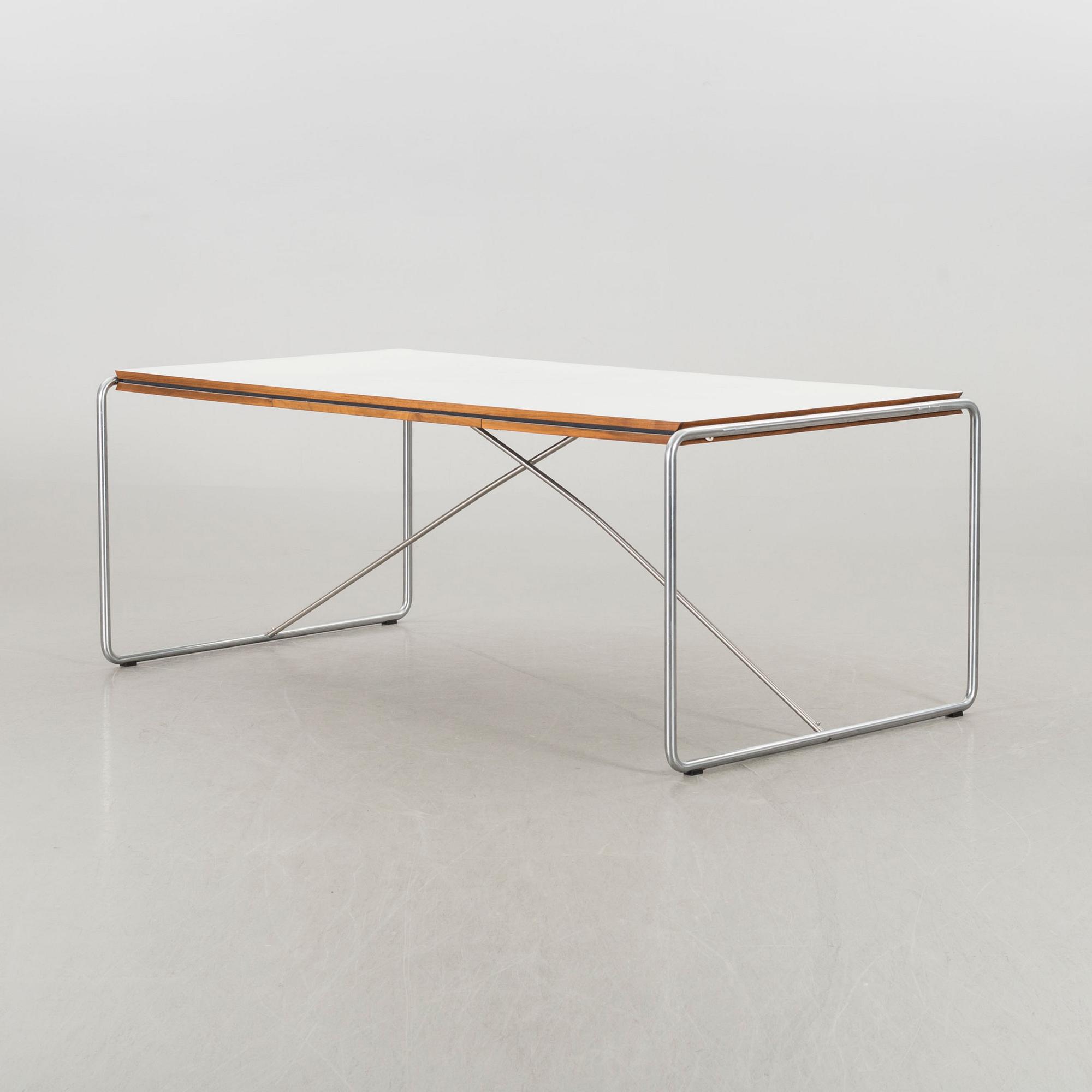 A Niels Haugesen dining table model nr 4750 Fredericia Furnitures Denmark alter part of the 20th century.
