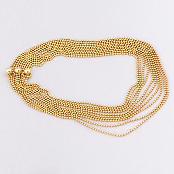 A CARTIER NECKLACE, 'Draperie De Decollete', 18K gold.