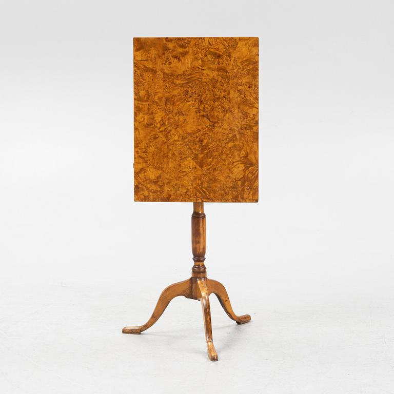 A Swedish alder root veneered tilt top table, early 19th Century.
