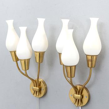 A pair of 1950s brass wall lamps.