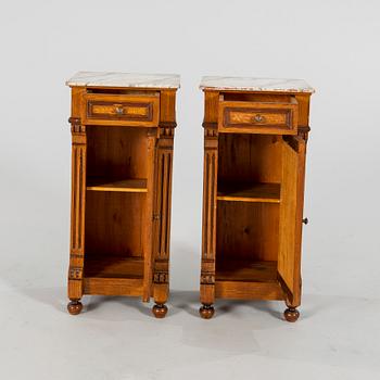 A pair of Neo Renaissance  bedside tables.