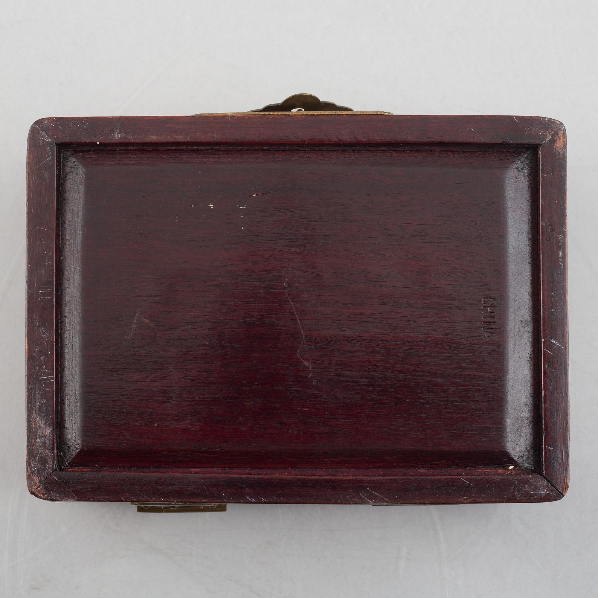 Two Chinese hardwood boxes with nephrite plaques, 20th century.