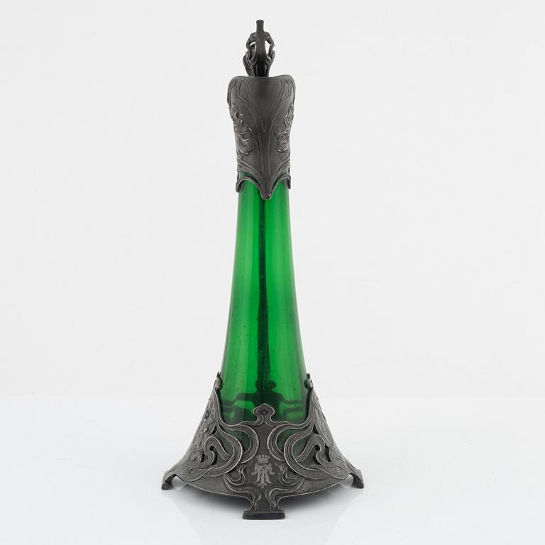 A silver plate and glass decanter, Art Nouveau, early 20th century.