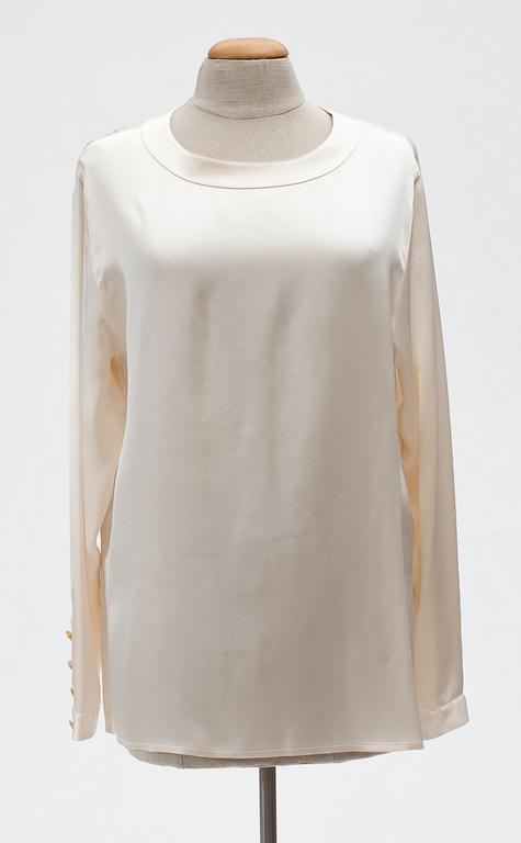 A Chanel silk blouse.