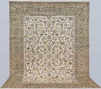A Keshan carpet, approx. 388 x 285 cm.