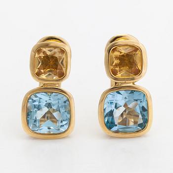 Cassandra Goad, a pair of 18K gold earrings with topazes and citrines. London.