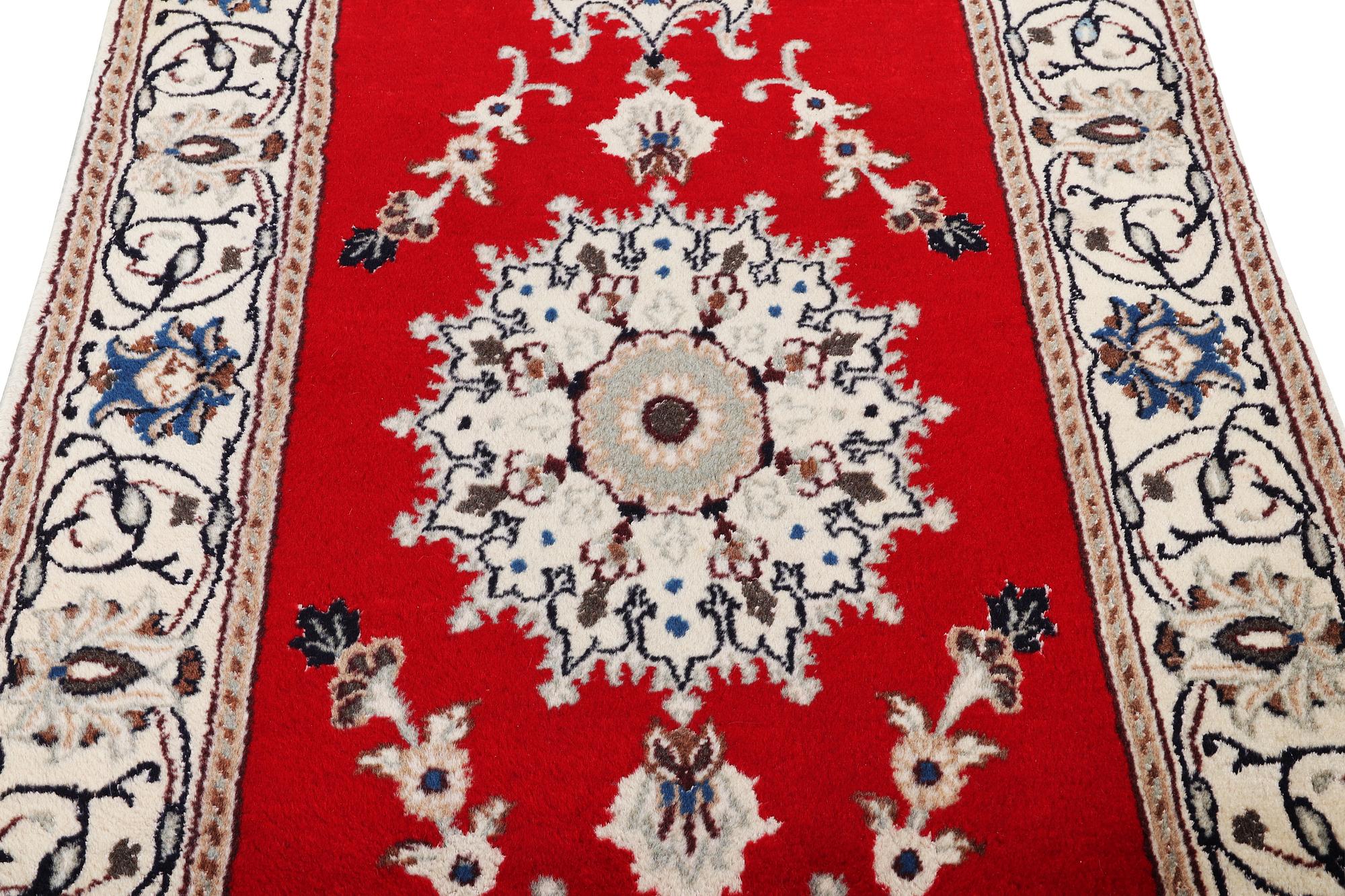 A runner carpet, Nain, part silk, 9 laa, c. 378 x 84 cm.