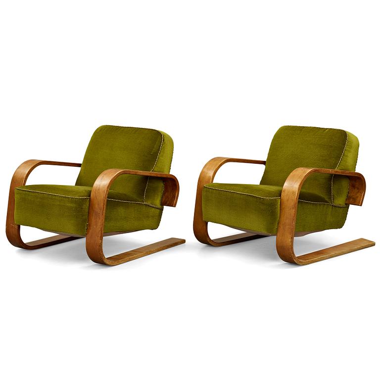 Alvar Aalto, a pair of  "Tank" easy chairs, "model 400", probably manaufactured by Aalto Design in Hedemora Sweden 1946-56.