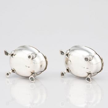 A pair of Latvian Rococo silver salt and pepper stands, marks of Johan Christian Henck (Henke), Riga 1768-80.