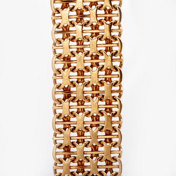 An 18K gold bracelet, 1975.