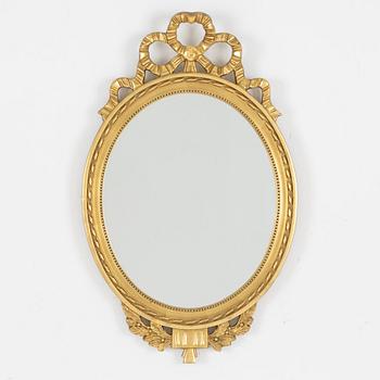 A Gustavian style mirror, mid 20th century.