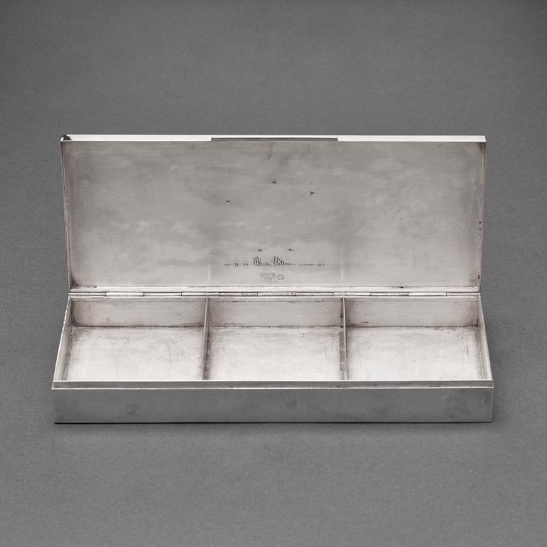 Wiwen Nilsson, a sterling rectangular box with a two colour gilt emblema in relief, Lund 1956.