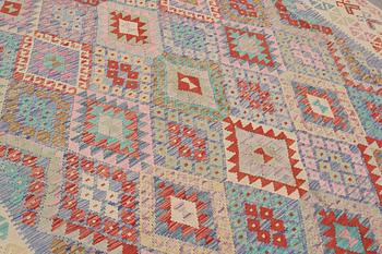 A carpet, kilim, ca 290 x 257 cm.