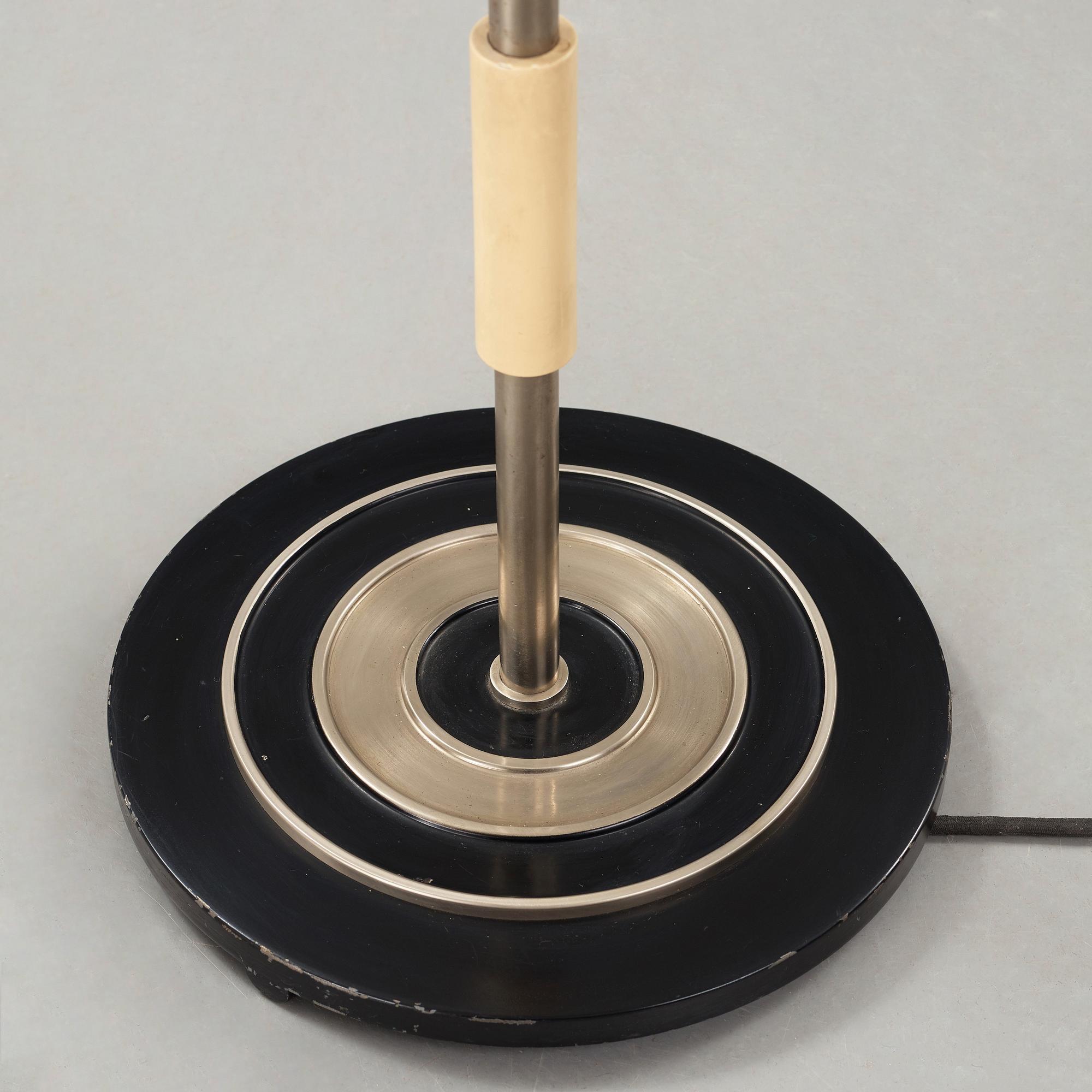 Harald Elof Notini, a white metal floor lamp, Böhlmark's, Stockholm 1930's.