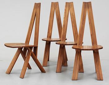 A set of four elm dinning chairs by Pierre Chapo, France 1960's.