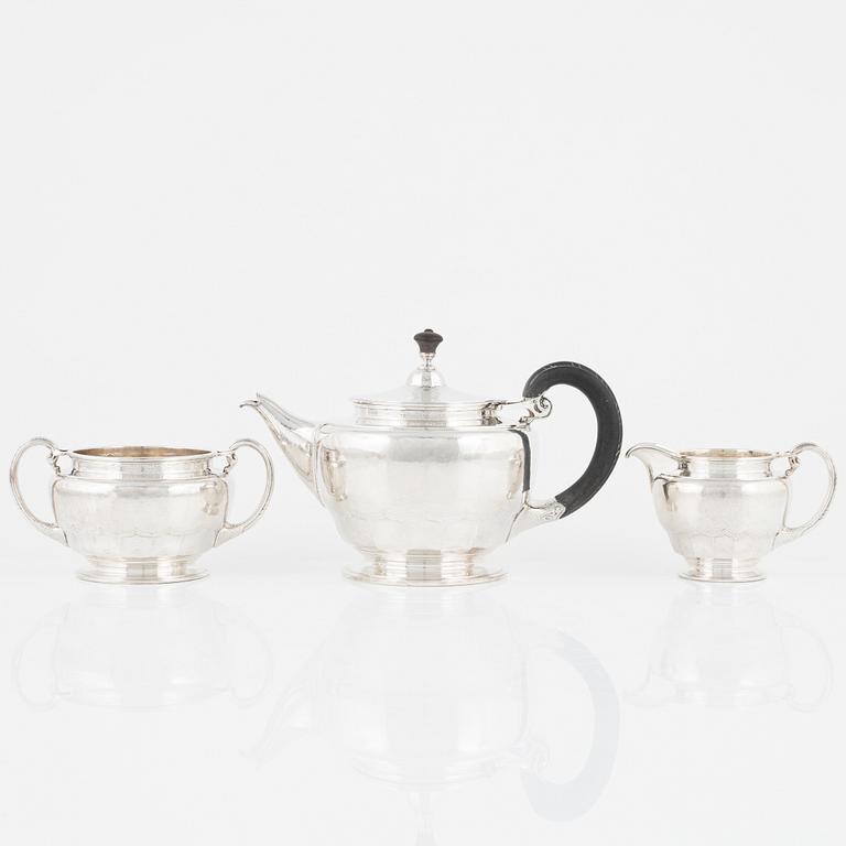 A Norwegian Silver Teapot, Sugar Bowl and Creamer, mark of David Andersen, Oslo circa 1923.