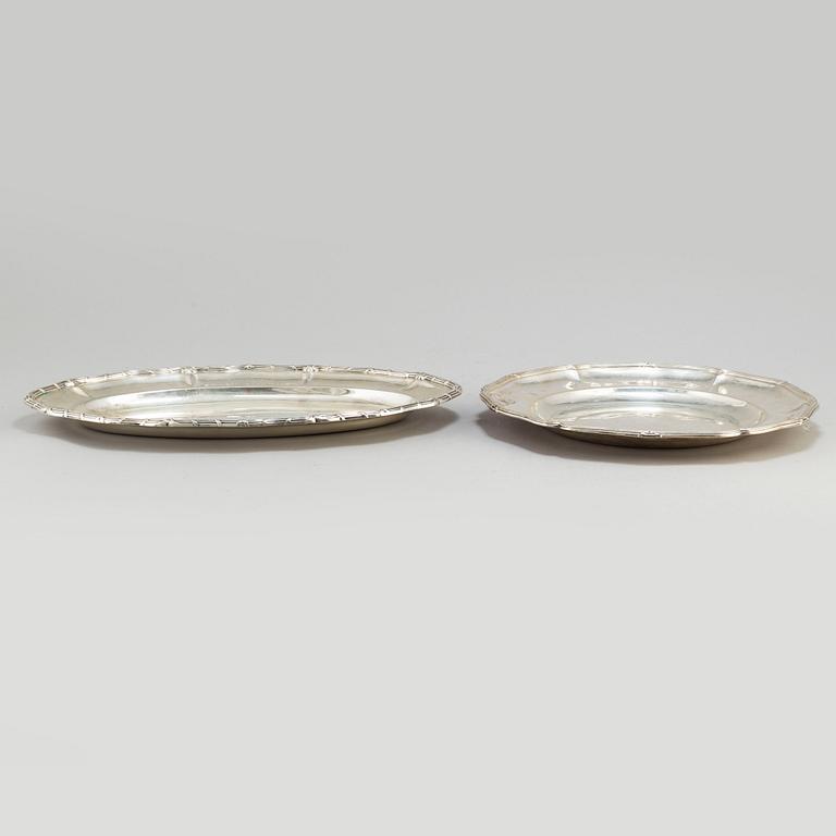 Two silver plates, including K Andersson, Stockholm, 1909 and 1914.