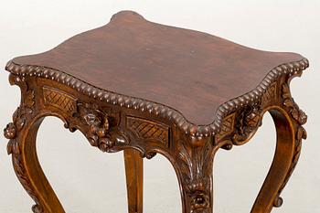A NEO ROCOCO SMALL TABLE.