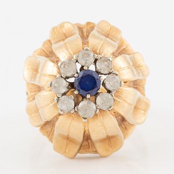Ring, Hans Scherlund, 18K gold with white and blue stones.