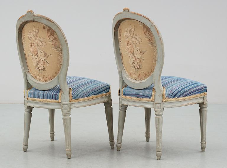 A pair of Gustavian 18th Century chairs.