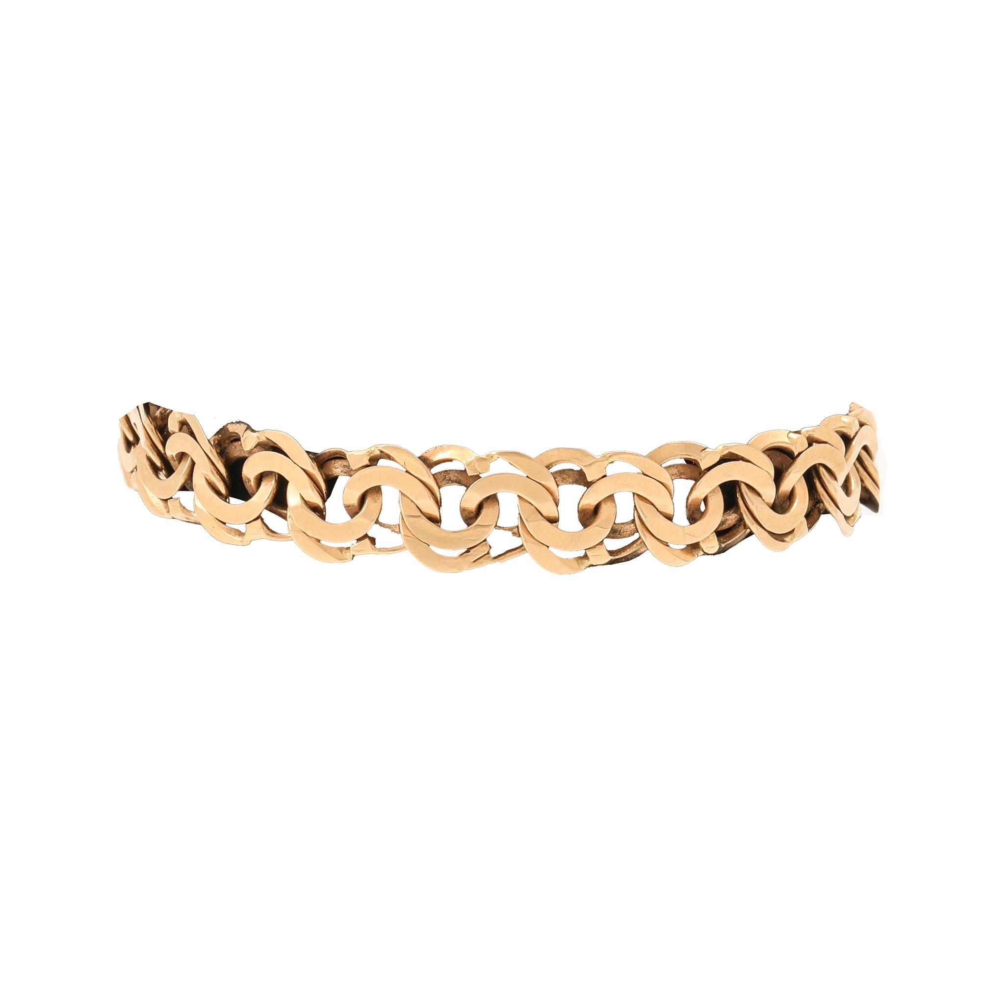 An 18K gold Bismarck bracelet.