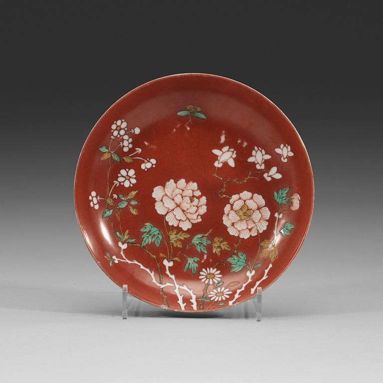 An enamelled coral-gorund dish, Qing dynasty with Daoguangs seal mark and period (1821-1850).