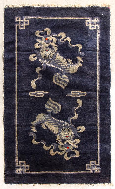 A semainatique Chinese Baotou carpet ca 120x65 cm.