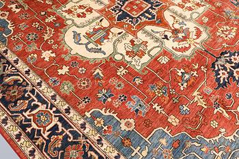 An Oriental carpet, approx. 372 x 274 cm.