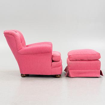 Josef Frank, a model 336 armchair with foot stool, Firma Svenskt Tenn.