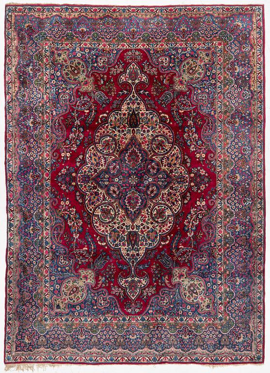 A Kerman carpet, c. 365 x 265 cm.
