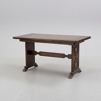 A 1920´s dinner table and six chairs probably designed by Axel Einar Hjorth for AB Svenska möbelfabriken Bodafors.